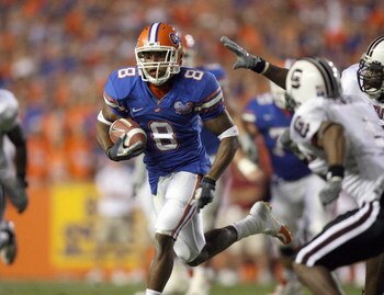 GAINESVILLE, FL - NOVEMBER 11:  Percy Harvin #8 of the University of Florida Gators carries the ball during the game against the South Carolina Gamecocks on November 11, 2006 at Ben Hill Griffin Stadium in Gainesville, Florida. Florida defeated South Caro