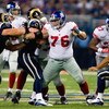 ST. LOUIS, MO - SEPTEMBER 14:  Chris Snee #76 of the New York Giants blocks the line during the game against the St. Louis Rams at Edward Jones Dome on September 14, 2008 in St. Louis, Missouri. (Photo by Dilip Vishwanat/Getty Images)