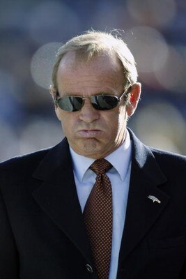 DENVER - DECEMBER 29:  Owner Pat Bowlen of the Denver Broncos exhales as he watches the Cleveland Browns beat the Atlanta Falcons causing the Broncos to be eliminated from the playoffs even before playing the Arizona Cardinals at Invesco Field at Mile Hig