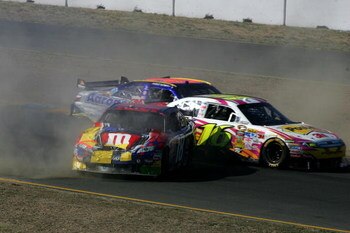 SONOMA, CA - JUNE 21: Greg Biffle, driver of the #16 3M/Post-it Ford, collides with Kyle Busch, driver of the #18 M&M's Toyota, and David Ruetimann, driver of the #00 Aaron's Dream Machine Toyota, during the NASCAR Sprint Cup Series Toyota/Save Mart 350 a