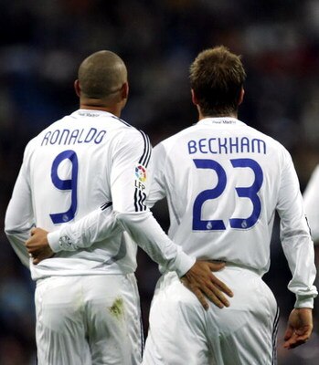 MADRID, SPAIN - NOVEMBER 09:  David Beckham of Real Madrid celebrates with Ronaldo after scoring a goal against Ecija during the Kings Cup fourth round second leg match between Real Madrid and Ecija at the Santiago Bernabeu stadium on November 9, 2006 in 