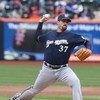 NEW YORK - APRIL 19:  Jeff Suppan #37 of the Milwaukee Brewers pitches against the New York Mets at Citi Field on April 19, 2009 in the Flushing neighborhood of the Queens borough of New York City.  (Photo by Nick Laham/Getty Images)