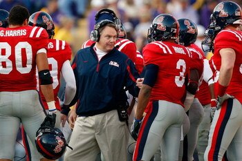 BATON ROUGE, LA - NOVEMBER 22:  Head coach Houston Nutt of the Ole Miss Rebels talks with his team during a timeout against the Louisiana State University Tigers on November 22, 2008 at Tiger Stadium in Baton Rouge, Louisiana.  (Photo by Chris Graythen/Ge