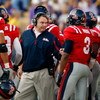 BATON ROUGE, LA - NOVEMBER 22:  Head coach Houston Nutt of the Ole Miss Rebels talks with his team during a timeout against the Louisiana State University Tigers on November 22, 2008 at Tiger Stadium in Baton Rouge, Louisiana.  (Photo by Chris Graythen/Ge
