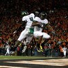 CORVALLIS, OR - NOVEMBER 29:  Ed Dickson #83 of the Oregon Ducks celebrates with Jaison Williams #4 after scoring a touchdown  against the Oregon State Beavers at Reser Stadium on November 29, 2008 in Corvalis, Oregon.  (Photo by Jonathan Ferrey/Getty Ima