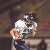 13 Dec 1996:  Chris Lemon of the Nevada Wolf Pack runs with the football during the Las Vegas Bowl game against the Ball State Cardinals at Sam Boyd Stadium in Las Vegas, Nevada.  Nevada won the game 18-15. Mandatory Credit: Jamie Squire  /Allsport
