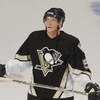 WASHINGTON - DECEMBER 11:  Defenseman Janne Laukkanen #5 of the Pittsburgh Penguins looks at the scoreboard during the NHL game against the Washington Capitals at the MCI Center in Washington D.C. on December 11, 2001.  The Penguins tied the Capitals 2-2.