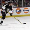 EAST RUTHERFORD, NJ - DECEMBER 6:  Defenseman Andrew Ference #7 of the Pittsburgh Penguins skates with the puck against the New Jersey Devils at Continental Airlines Arena on December 6, 2002 in East Rutherford, New Jersey. The Devils won 2-1. (Photo by E