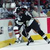 BUFFALO, NY - JANUARY 21:  Hans Jonsson #8 of the Pittsburgh Penguins pins Tim Connolly #18 of the Buffalo Sabres against the boards on January 21, 2002 at HSBC Arena in Buffalo, New York.  The Penguins and Sabres skated to a 0-0 tie.  (Photo by Rick Stew