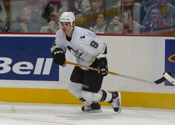 KANATA, CANADA - SEPTEMBER 29:  Rico Fata #9 of the Pittsburgh Penguins turns in the corner during their NHL pre-season game against the Ottawa Senators at the Corel Centre September 29, 2005 in Kanata, Ontario, Canada. The Senators beat the Penguins 4-1.
