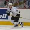 KANATA, CANADA - SEPTEMBER 29:  Rico Fata #9 of the Pittsburgh Penguins turns in the corner during their NHL pre-season game against the Ottawa Senators at the Corel Centre September 29, 2005 in Kanata, Ontario, Canada. The Senators beat the Penguins 4-1.