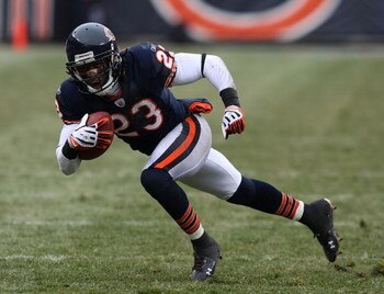 CHICAGO - DECEMBER 07: Devin Hester #23 of the Chicago Bears runs for yardage after catching a pass against the Jacksonville Jaguars on December 7, 2008 at Soldier Field in Chicago, Illinois. The Bears defeated the Packers 23-10. (Photo by Jonathan Daniel