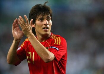 VIENNA, AUSTRIA - JUNE 22:  David Silva of Spain acknowledges the fans after victory in the UEFA EURO 2008 Quarter Final match between Spain and Italy at Ernst Happel Stadion on June 22, 2008 in Vienna, Austria.  (Photo by Clive Rose/Getty Images)