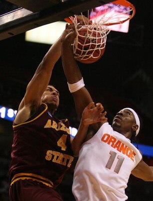MIAMI - MARCH 22:  Forward Paul Harris #11 of the Syracuse Orange is dunked on by forward Jeff Pendergraph #4 of the Arizona State Sun Devils during the second round of the NCAA Division I Men's Basketball Tournament at the American Airlines Arena on Marc