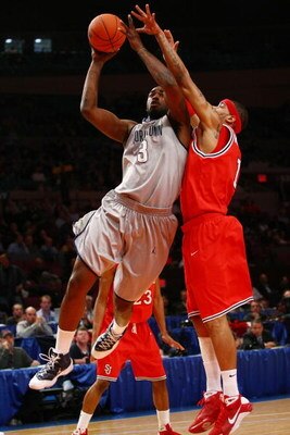 NEW YORK - MARCH 10:  DaJuan Summers #3 of the Georgetown Hoyas goes to the hoop against D.J. Kennedy #1 of the St. John's Red Storm during the first round of the Big East Tournament at Madison Square Garden on March 10, 2009 in New York City.  (Photo by 