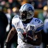 GREEN BAY, WI - DECEMBER 28: Kevin Smith #34 of the Detroit Lions runs for yardage against the Green Bay Packers on December 28, 2008 at Lambeau Field in Green Bay, Wisconsin. The Packers defeated the Lions 31-21. (Photo by Jonathan Daniel/Getty Images)