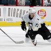 BUFFALO, NY - OCTOBER 10:  Koltsov Konstantin #71 of the Piitsburgh Penguins tries to control the puck from his knees against the Buffalo Sabres October 10, 2005 at HSBC Arena in Buffalo, New York.  (Photo by Rick Stewart/Getty Images)