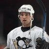 CHICAGO - OCTOBER 30:  Ramzi Abid #19 of the Pittsburgh Penguins looks on during warm up prior to a game against the Chicago Blackhawks on October 30, 2003 at the United Center in Chicago, Illinois.  The Penguins defeated the Blackhawks 1-0.   (Photo by J