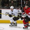 OTTAWA - JANUARY 22:  Center Brian Holzinger #15 of the Pittsburgh Penguins skates past defenseman Karel Rachunek #23 of the Ottawa Senators during the game at Corel Centre on January 22, 2004 in Ottawa, Ontario. The Senators defeated the Penguins 6-5. (P
