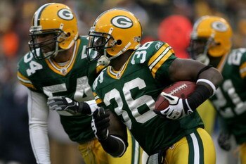 GREEN BAY, WI - NOVEMBER 16:  Safety Nick Collins #36 of the Green Bay Packers makes an interception that was nullified by a penalty against the Chicago Bears during NFL action at Lambeau Field on November 16, 2008 in Green Bay, Wisconsin. The Packers def