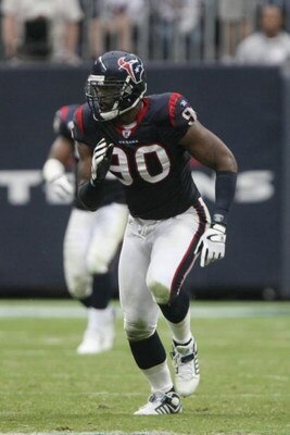 HOUSTON - NOVEMBER 18:  Mario Williams #90 of the Houston Texans runs during the NFL game against the New Orleans Saints at Camp Reliant Stadium on November 18, 2007 in Houston, Texas. (Photo by Stephen Dunn/Getty Images)