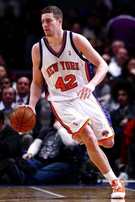 NEW YORK - JANUARY 23:  David Lee #42 of the New York Knicks dribbles the ball upcourt during the game against the Memphis Grizzlies at Madison Square Garden January 23, 2009 in New York City. NOTE TO USER: User expressly acknowledges and agrees that, by 