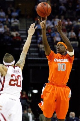 MEMPHIS, TN - MARCH 27:  Jonny Flynn #10 of the Syracuse Orange goes up for a shot over Austin Johnson #20 of the Oklahoma Sooners in the second half during the NCAA Men's Basketball Tournament South Regionals at the FedExForum on March 27, 2009 in Memphi