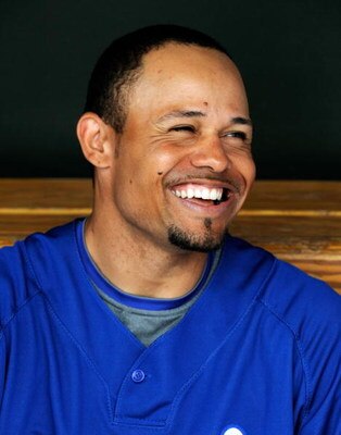 SURPRISE, AZ - MARCH 03:  Coco Crisp #2 of the Kansas City Royals follows the aaction from the dugout against the Cleveland Indians during a spring training game at the Surprise Stadium on March 3, 2009 in Surprise, Arizona.  (Photo by Kevork Djansezian/G
