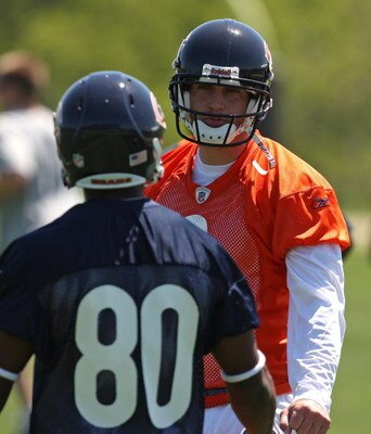 LAKE FOREST, IL - MAY 20: Jay Cutler #6 of the Chicago Bears gives instructions to teammate Earl Bennett #80 during an organized team activity (OTA) practice on May 20, 2009 at Halas Hall in Lake Forest, Illinois.  (Photo by Jonathan Daniel/Getty Images)