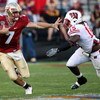 ORLANDO, FL - DECEMBER 27:  Christian Ponder #7 of the Florida State Seminoles attempts to avoid the tackle of Culmer St. Jean #15 of the Wisconsin Badgers during the Champs Bowl on December 27, 2008 at the Citrus Bowl in Orlando, Florida.  (Photo by Sam 