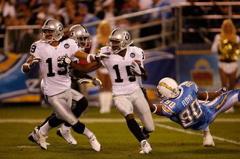 SAN DIEGO - DECEMBER 04:  Johnnie Lee Higgins #15 of the Oakland Raiders returns the ball against the San Diego Chargers after a kick off during their NFL Game on December 4, 2008 at Qualcomm Stadium in San Diego, California.  (Photo by Harry How/Getty Im
