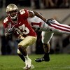ORLANDO, FL - DECEMBER 27:  Bert Reed #83 of the Florida State Seminoles breaks the tackle of Chris Maragos #21 of the Wisconsin Badgers during the Champs Bowl on December 27, 2008 at the Citrus Bowl in Orlando, Florida.  (Photo by Sam Greenwood/Getty Ima