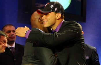 NEW YORK - JUNE 25: First overall draft pick by the Los Angeles Clippers,  Blake Griffin is congratulated by members of his entourage during the 2009 NBA Draft at the Wamu Theatre at Madison Square Garden June 25, 2009 in New York City. NOTE TO USER: User