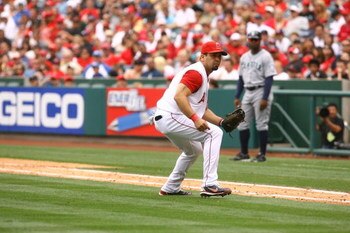 ANAHEIM, CA - MAY 31:  Kendry Morales #19 of the Los Angeles Angels of Anaheim fields a ground ball against the Seattle Mariners at Angel Stadium on May 31, 2009 in Anaheim, California. The Angels defeated the Mariners 9-8.  (Photo by Jeff Gross/Getty Ima