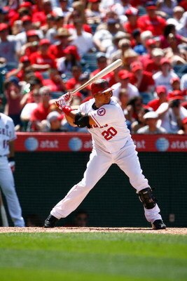 ANAHEIM, CA - JUNE 14:  Juan Rivera #20 of the Los Angeles Angels of Anaheim bats against the San Diego Padres at Angel Stadium on June 14, 2009 in Anaheim, California. The Angels defeated the Padres 6-0.  (Photo by Jeff Gross/Getty Images)
