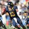 BERKELEY, CA - NOVEMBER 22:  Kevin Riley #13 of the California Golden Bears passes against the Stanford Cardinal during an NCAA football game on November 22, 2008 at Memorial Stadium in Berkeley, California.  (Photo by Jed Jacobsohn/Getty Images)
