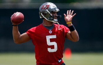 TAMPA - MAY 01:  Quarterback Josh Freeman #5 of the Tampa Bay Buccaneers throws a pass during the Buccaneers Rookie Minicamp at One Buccaneer Place on May 1, 2009 in Tampa, Florida.  (Photo by J. Meric/Getty Images)