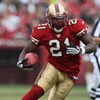 SAN FRANCISCO - DECEMBER 07:  Frank Gore #21 of the San Francisco 49ers runs against the New York Jets during an NFL game on December 7, 2008 at Candlestick Park in San Francisco, California.  (Photo by Jed Jacobsohn/Getty Images)