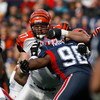 ORCHARD PARK, NY - NOVEMBER 04: Andrew Whitworth #77 of the Cincinnati Bengals blocks Larry Tripplett #98 of the Buffalo Bills  on November 4, 2007 at Ralph Wilson Stadium in Orchard Park, New York. (Photo by Rick Stewart/Getty Images)