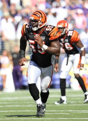 BALTIMORE - SEPTEMBER 7: Linebacker Keith Rivers #55 of the Cincinnati Bengals looks to make a tackle against # of the Baltimore Ravens at M&T Bank Stadium on September 7, 2008 in Baltimore, Maryland. The Ravens won 17-10. (Photo by Ned Dishman/Getty Imag