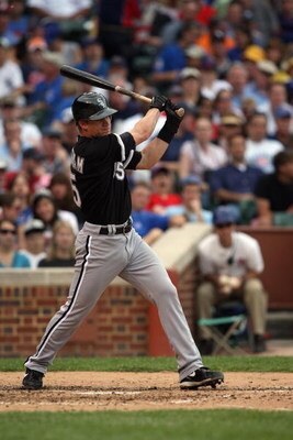 CHICAGO - JUNE 18:  Gordon Beckham #15 of the Chicago White Sox bats against the Chicago Cubs during the game on June 18, 2009 at Wrigley Field in Chicago, Illinois. (Photo by Jonathan Daniel/Getty Images)