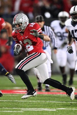 COLUMBUS, OH - OCTOBER 25: Wide receiver Dane Sanzenbacher #12 of the Ohio State Buckeyes runs with the ball against the Penn State Nittany Lions on October 25, 2008 at Ohio Stadium in Columbus, Ohio.  (Photo by Jamie Sabau/Getty Images)