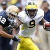 SOUTH BEND, IN - SEPTEMBER 13:  Martavious Odoms #9 of the Michigan Wolverines tries to get around Robert Blanton #12 of the Notre Dame Fighting Irish during a second quarter action on September 13, 2008 at Notre Dame Stadium in South Bend, Indiana.  (Pho