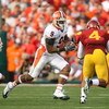 PASADENA, CA - JANUARY 01:  Wide receiver Arrelious Benn #9 of the Illinois Fighting Illini runs for yardage against Kevin Ellison #4 of the USC Trojans during the Rose Bowl presented by Citi at the Rose Bowl on January 1, 2008 in Pasadena, California. Th