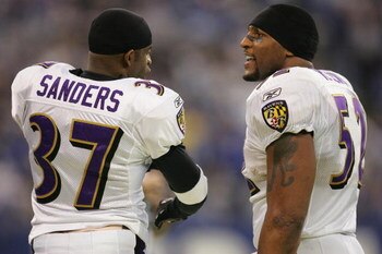INDIANAPOLIS, IN - DECEMBER 19:  Cornerback Deion Sanders #37 and linebacker Ray Lewis #52 of the Baltimore Ravens talk during the game against the Indianapolis Colts on December 19, 2004 at the RCA Dome in Indianapolis, Indiana. The Colts defeated the Ra