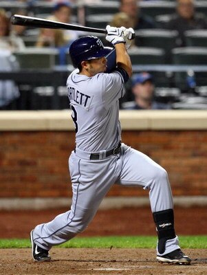 NEW YORK - JUNE 19: Jason Bartlett #8 of the Tampa Bay Rays connects for a base hit against the New York Mets on June 19, 2009 at Citi Field in the Flushing neighborhood of the Queens borough of New York City.  (Photo by Jim McIsaac/Getty Images)