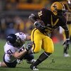 TEMPE, AZ - DECEMBER 01:  Dimitri Nance #31 of the Arizona State breaks the tackle of Spencer Larsen #51 of the University of Arizona Wildcats during the second quarter at Sun Devil Stadium on December 1, 2007 in Tempe, Arizona.  (Photo by Harry How/Getty