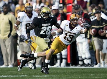 BOULDER, CO - SEPTEMBER 16:  Chris McGaha #13 of the Arizona State Sun Devils is unable to hang onto a pass as Terrence Wheatley #26 of the University of Colorado Buffaloes defends at Folsom Field on September 16, 2006 in Boulder, Colorado.  (Photo by Dou