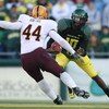 EUGENE, OR - NOVEMBER 03:  Quarterback Dennis Dixon #10 of the Oregon Ducks rushes against Travis Goethel #44 of the Arizona State Sun Devils at Autzen Stadium on November 3, 2007 in Eugene, Oregon. (Photo by Otto Greule Jr/Getty Images)