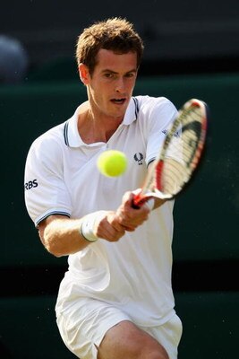 WIMBLEDON, ENGLAND - JUNE 25:  Andy Murray of Great Britain plays a backhand during the men's singles second round match against Ernests Gulbis of Latvia on Day Four of the Wimbledon Lawn Tennis Championships at the All England Lawn Tennis and Croquet Clu